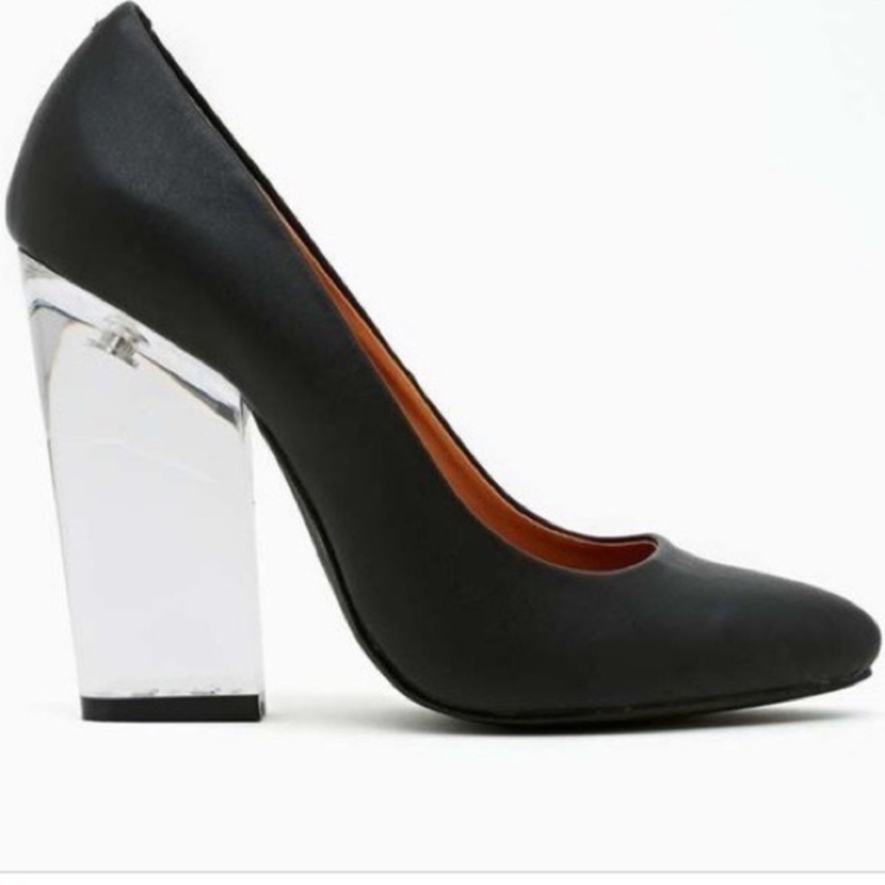 Black pumps with lucite heel